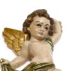 dark haired cherub with gold wings