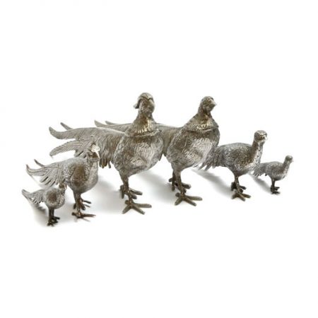 large and small ornamental metal pheasants