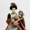 close up of geisha doll
