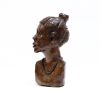 side view of carved wood bust of african lady