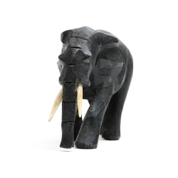 carved wood african elephant with tusks