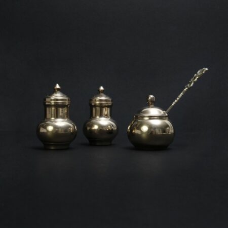 set of brass condiment holders