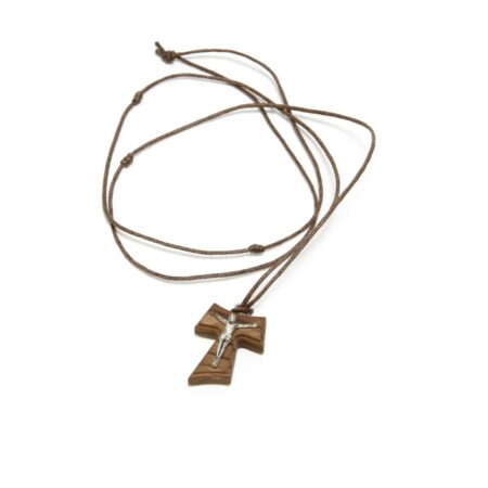 small wood cross with metalic jesus on a cord