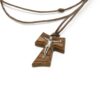 small wood cross with metalic jesus