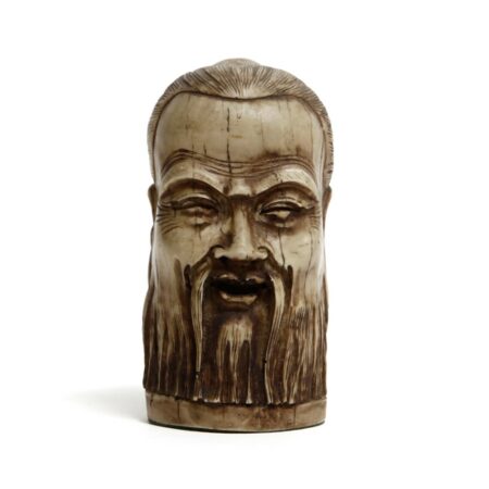 a japanese netsuke bust of a mans head
