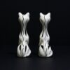 rear of hand painted black and white ornamental cats