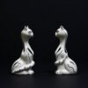 side of hand painted black and white ornamental cats