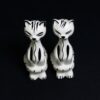 top of hand painted black and white ornamental cats