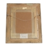 rear of ornate gold rocco style picture frame